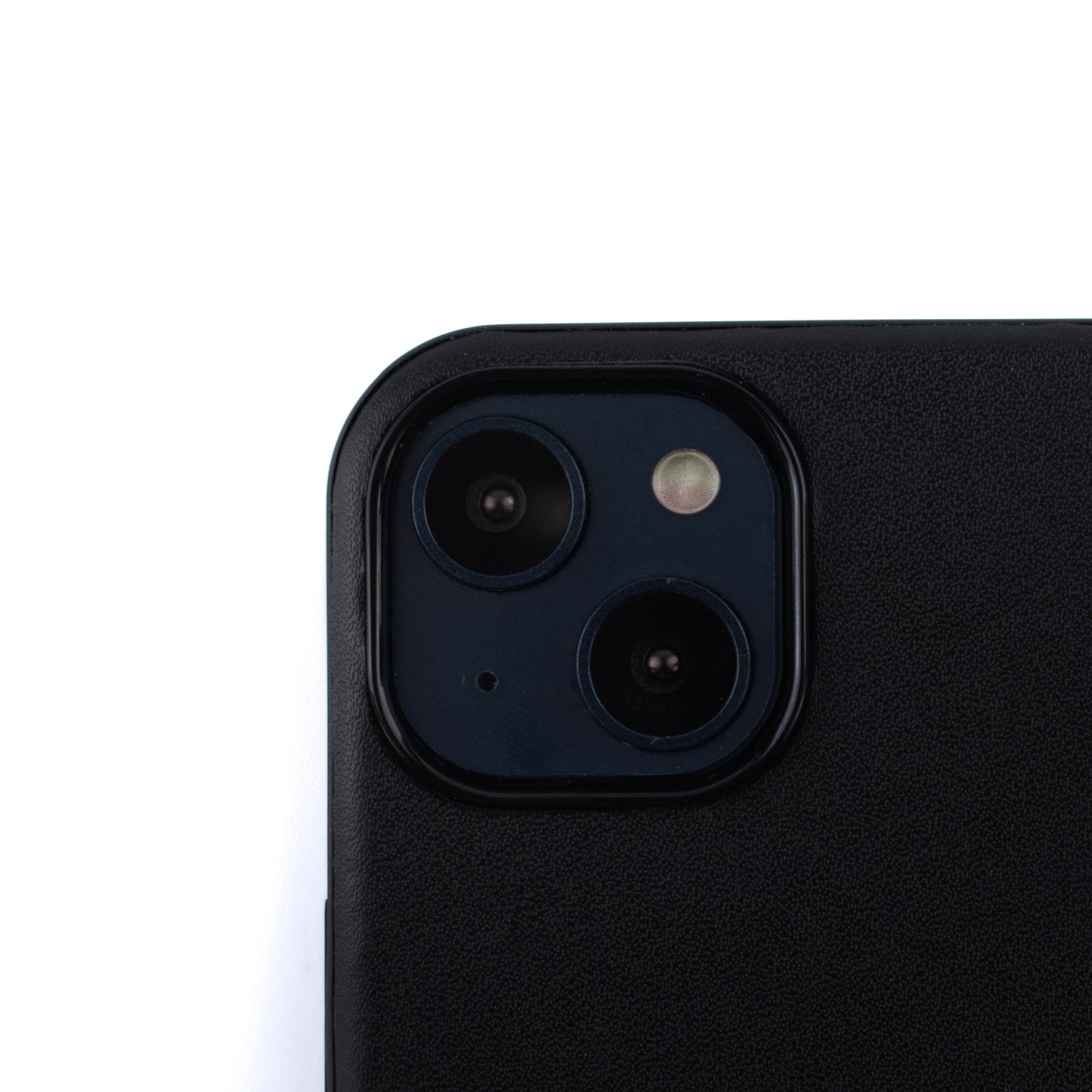 Close up of the SKNS LEATHER Black MagSafe case fitted to the iPhone 15 & 14 Plus showing the Protective raised lip