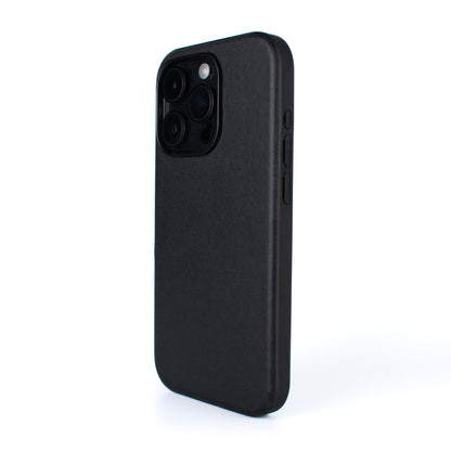 Angled side image of the SKNS LEATHER Black MagSafe case fitted on the iPhone 15 Pro Max showing the leather texture and slim style