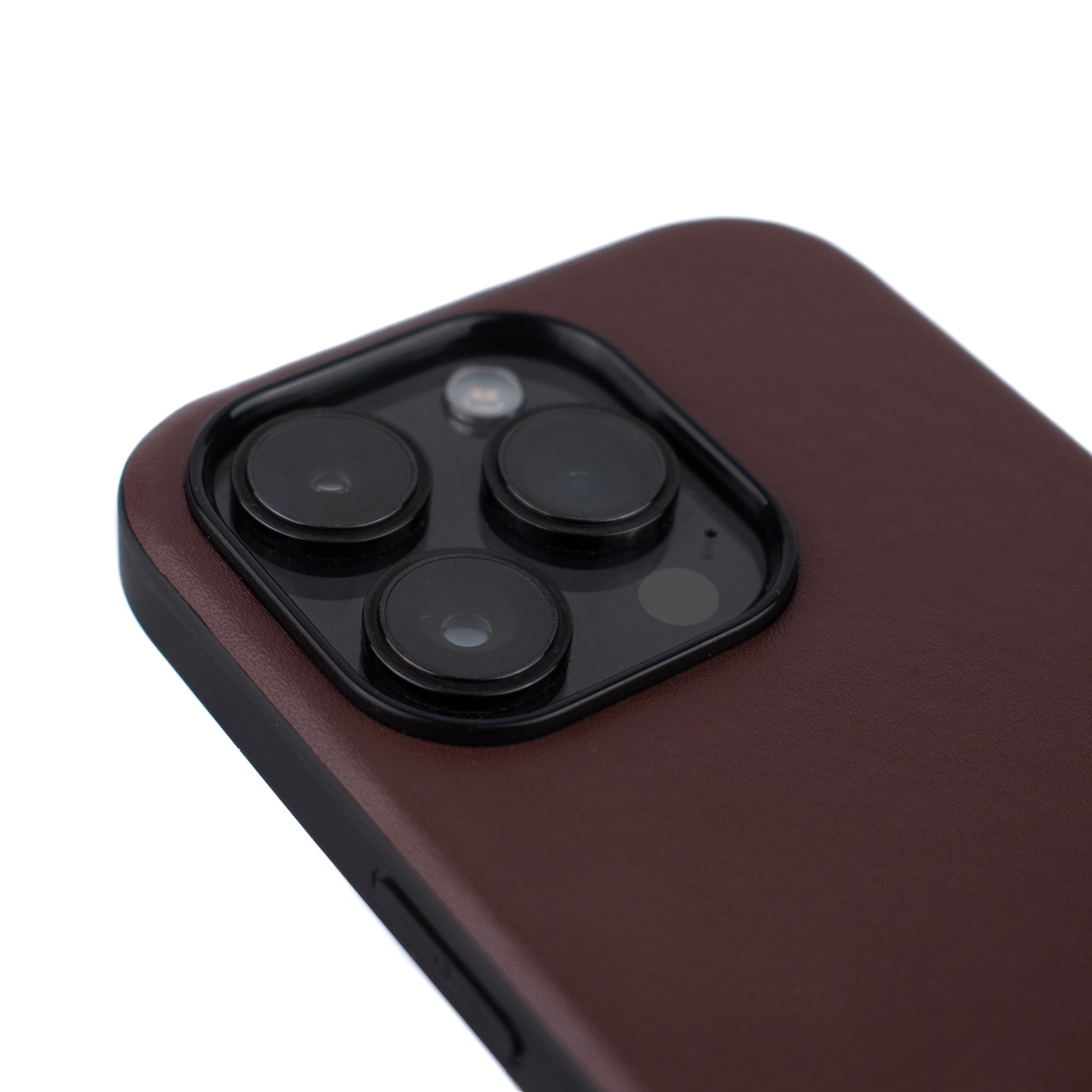 Close up angled image of the SKNS LEATHER Brown cases back highlighting the raised lip around the iPhone 14 15 pro max camera