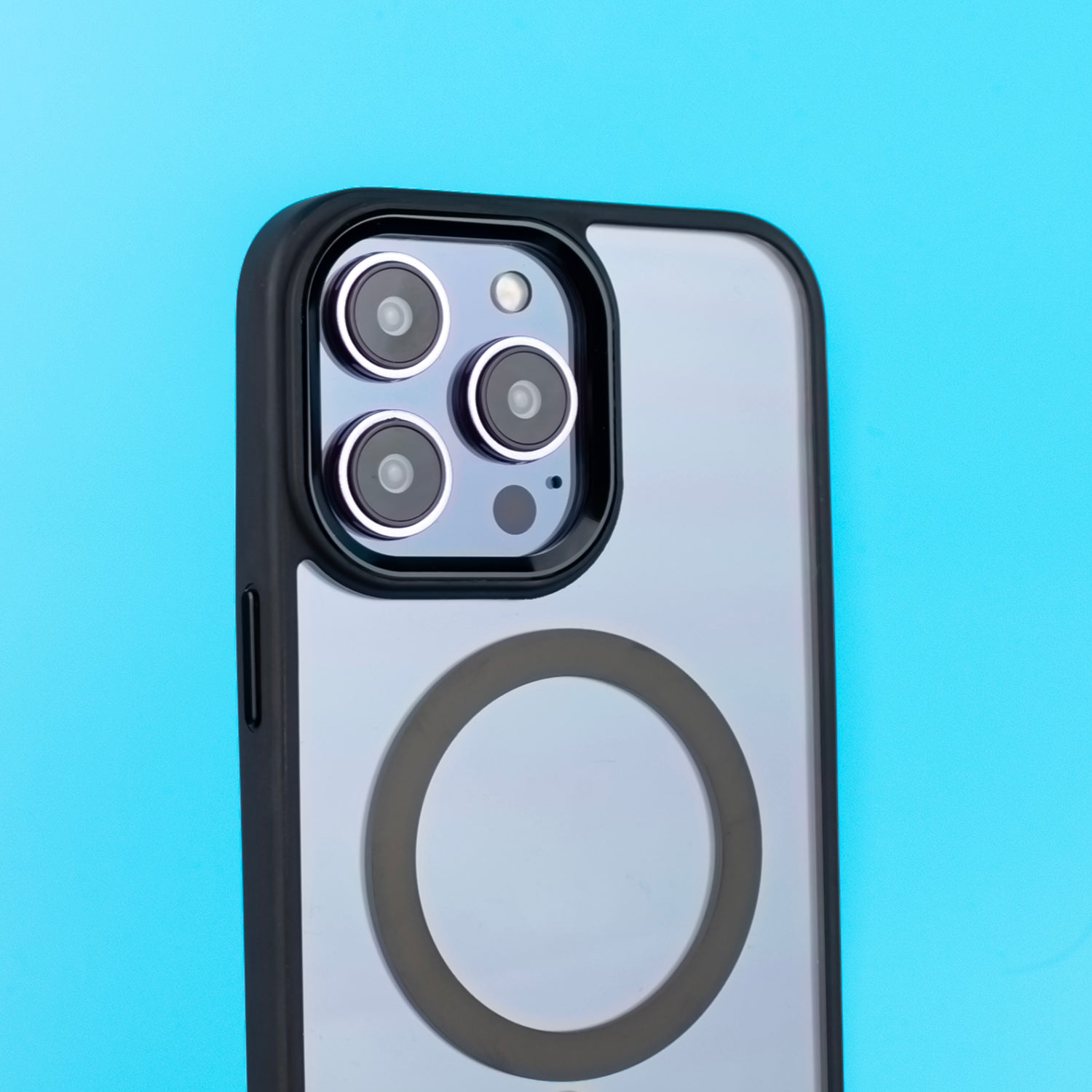 Vibrant lifestyle image of the SKNS SHOCK case on the iPhone 14 Pro Max on a bright background highlighting the crystal clear back and MagSafe ring