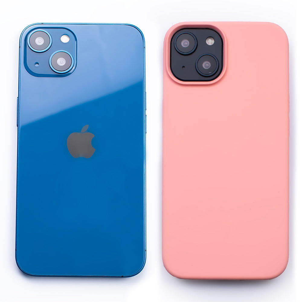 Side by side back image of the SKNS SILICONE Soft & Protective Soft Pink Case fitted to the iPhone 14 Plus next to a plain iPhone highlighting the Protective slim design