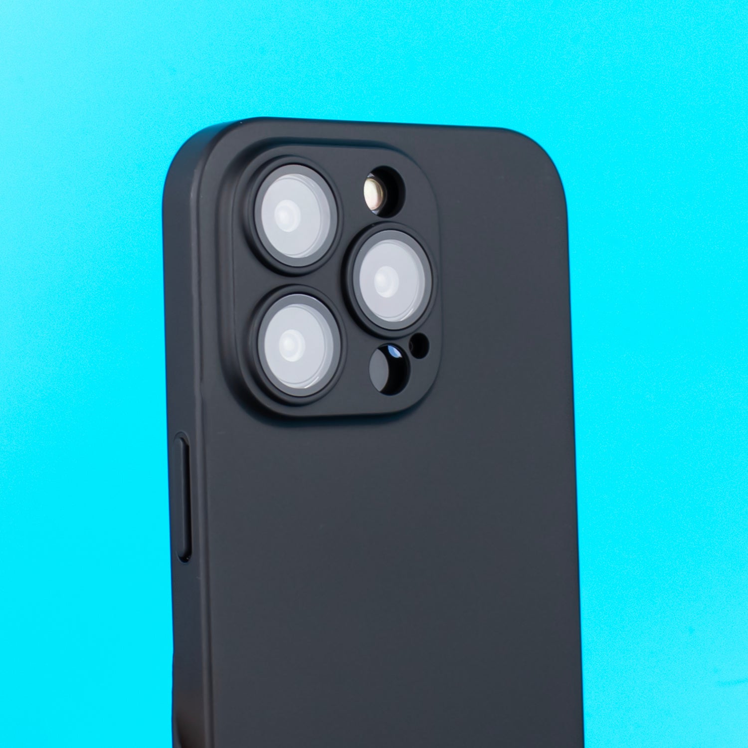 Side angled picture of the SKNS THIN V2 Case fitted to the iPhone 14/13 Pro Max highlighting the perfect fit and button covers